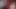 Mit Strapon, Latex Body und Maske masturbiert