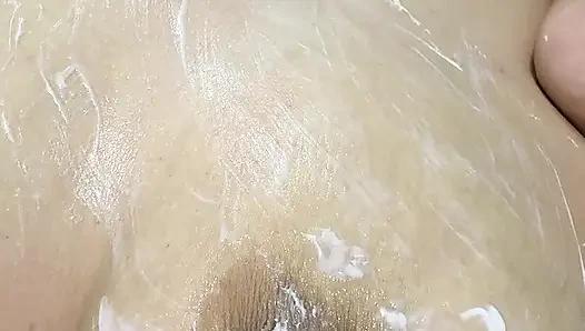 Mom vibrates her big tits with her big vibrator