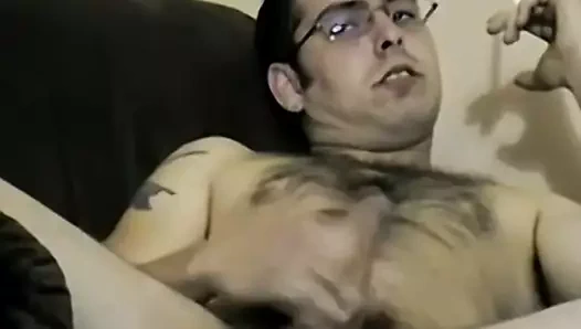 Inked amateur gay Brad jerks off before big cum explosion