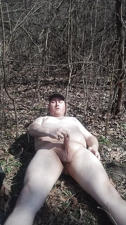 Fat guy jerking & cumming in forrest pt. 13