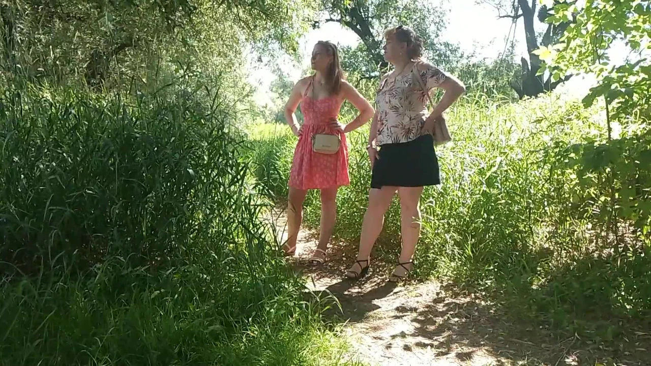 Two women girl and mature milf took off red panties peeing on side of road in public Pee Outdoor Outside  Lesbians kiss
