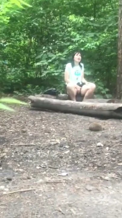 She's pleasuring her pussy  a sweet brunette MILF in the forest, and I'm secretly watching her! | Clip 1
