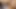 Ateşli orta yaşlı seksi kadın yatakta yağ masajı yapıyor. Siyah boğa büyük olgun götüne yağ sürüyor