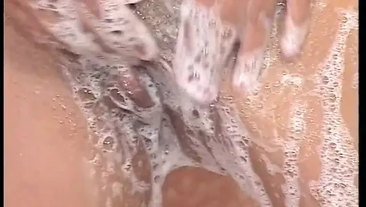 Hairy MILF slut masturbates under shower