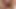 Seksi sarışın bahçede kedi ile oynuyor