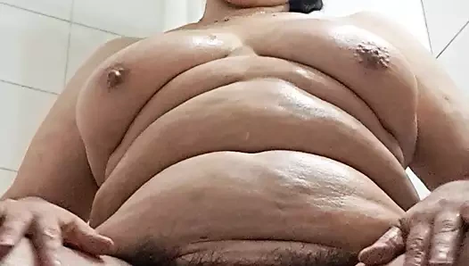 creaming the body with open legs.