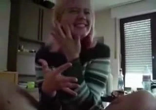 Pink haired girl jerks off a big cock