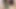Orta yaşlı seksi kadın göğüsleri ve salatalık ile oynuyor, diliyle ıslatıyor