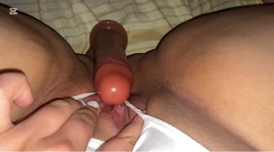 My white panty on the side to rub my clitoris with this rich dildo while I imagine your cock