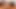 Büyük siyah dildo, bodystocking, overknee çizmeler ve fışkırtma