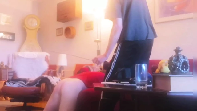 Amateurboy is caned on feet and ass