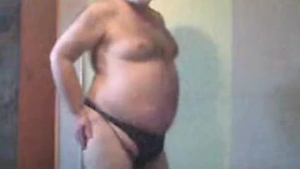 Fat boy dancing in g string