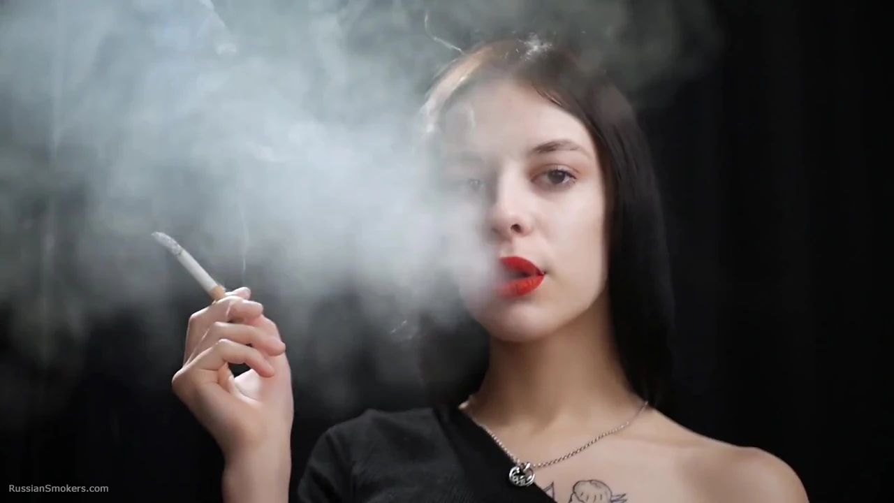 Slim Chick Is Smoking Two Reds