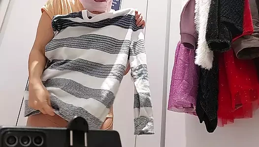 Sexy brunette tries on clothes in fitting room. I'm looking at a hairy mom, hairy pussy, big tits, big ass.