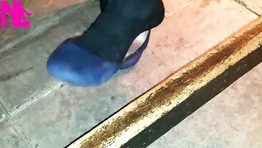 Dangling in Blue Ballet Flats in a Bar
