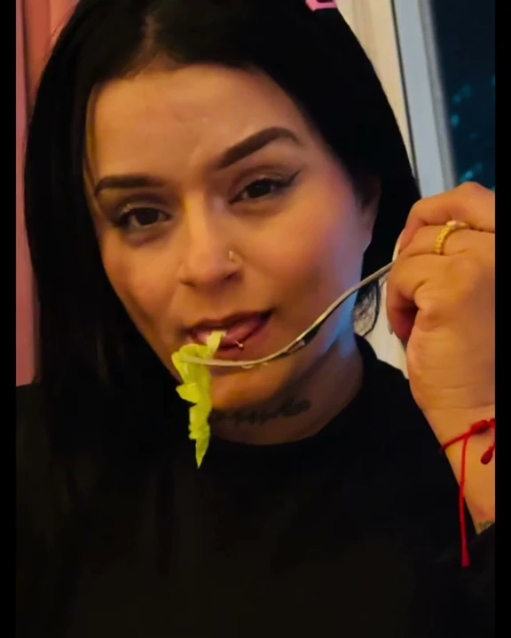 Latina and hot eating in an extremely delightful way