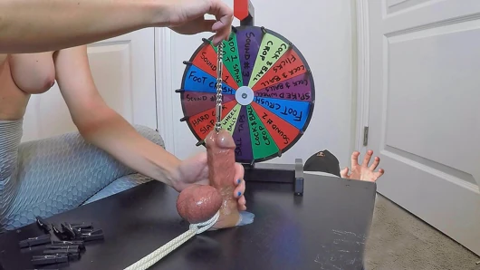 She inserts a 30cm probe all the way into his meaty cock. Playing BDSM roulette.