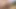 Edepsiz genç kız fışkırtırken bir adam kanepede yumruk sokuyor ve amını sikiyor