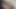 Seksi esmer evin etrafında çıplak ev işleri yapıyor