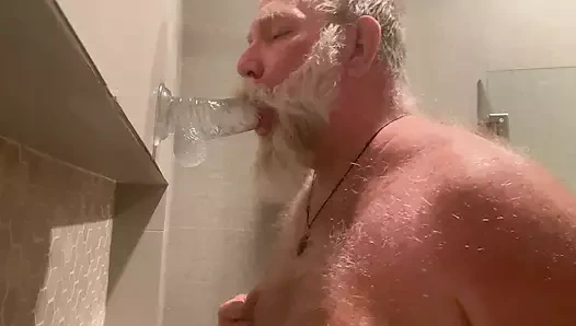 DaddybearAZ deep throats a dildo in the shower