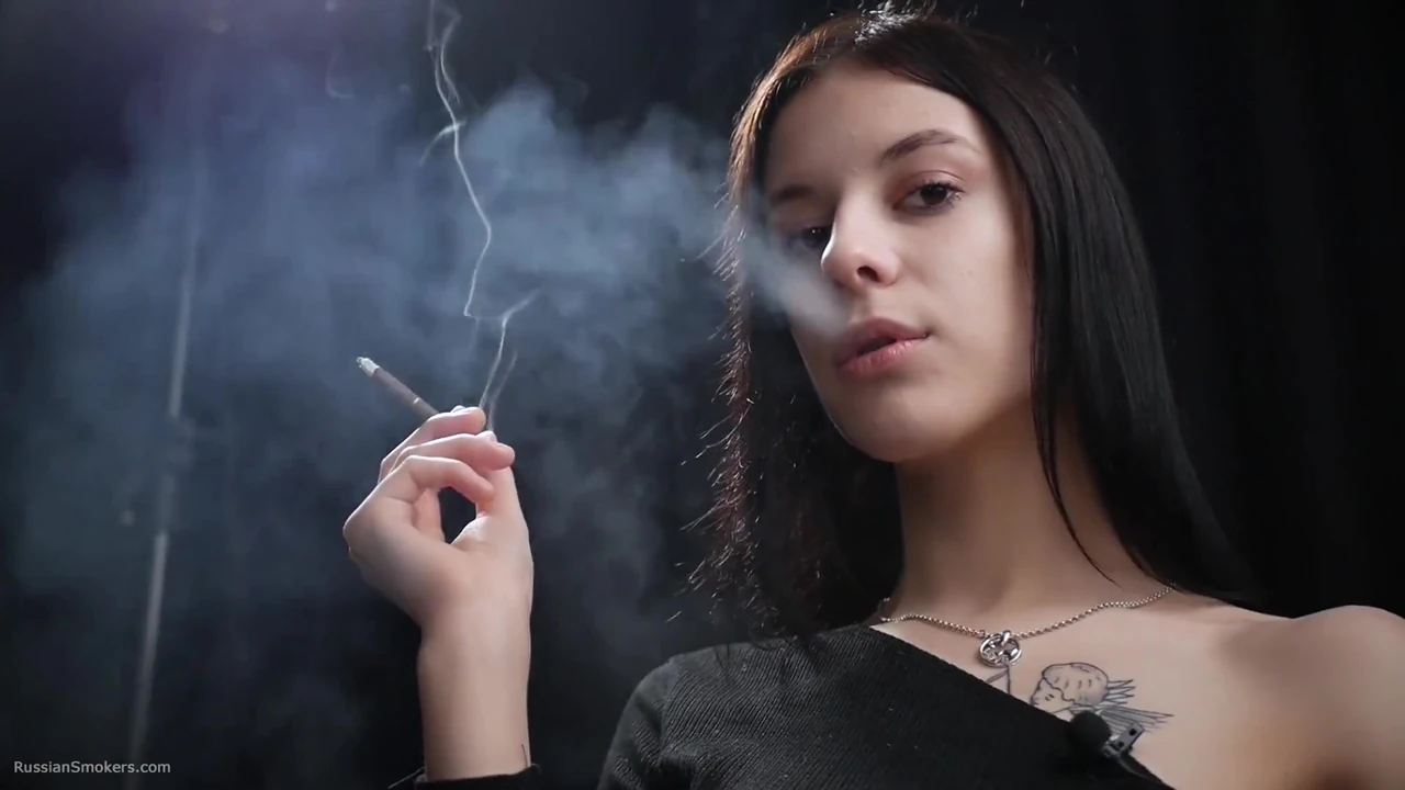 Slim Chick Is Smoking One Red