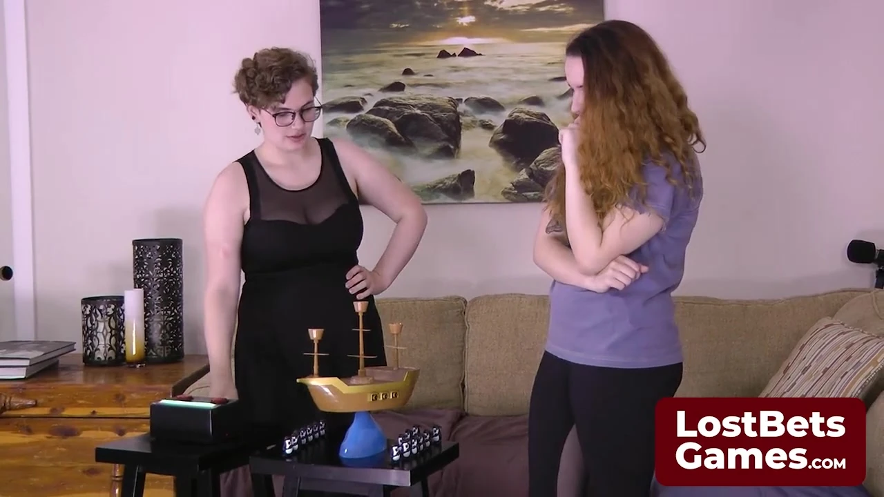 A sexy dynamic duo are playing a Strip Pirate Penguins game