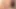 Brunette ladyboy with big tits strips her pink panties and