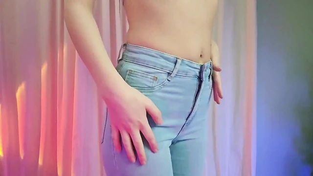 Redhead Striptease Out of Skinny Jeans