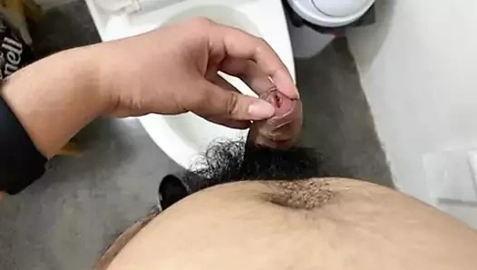 20 years old college boy pissing and blasting cumshot with retracted foreskin