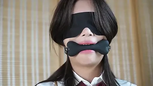 Xr46- Student Uniform and Mouthball Bondage