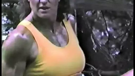 Joanne McCartney - yellow deux pieces, on the railroad