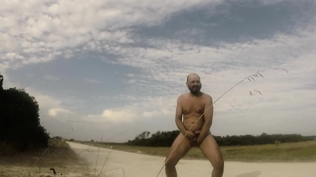 Handjob every naked with cum at the end, on a public road