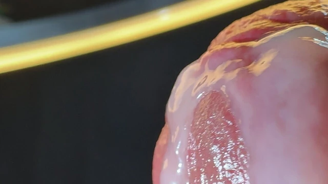 Wet penis gets masturbated