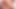 Yağlanmış esmer dildo ile kıllı amcıkla oynuyor