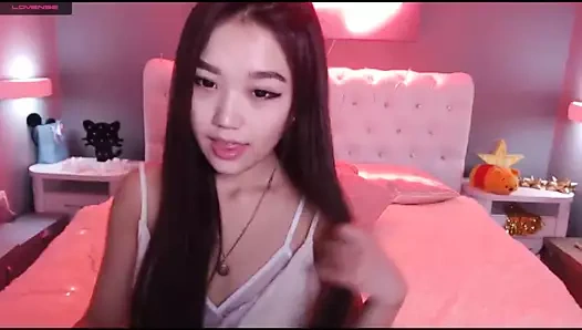 Tatlı Asyalı web kamerası kızı