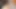 2026 Roma bombası, uzun siyah saçlı, çıplak fotoğraf çekimi - evde halıda poz veren büyük bir çingene kadın, vajinası yakından, siyah tanga aşağı çekilmiş.