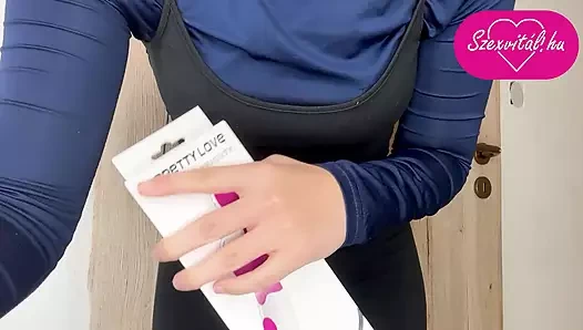 My stepsister  is showing me the vibrator he's going to try in the bathroom.