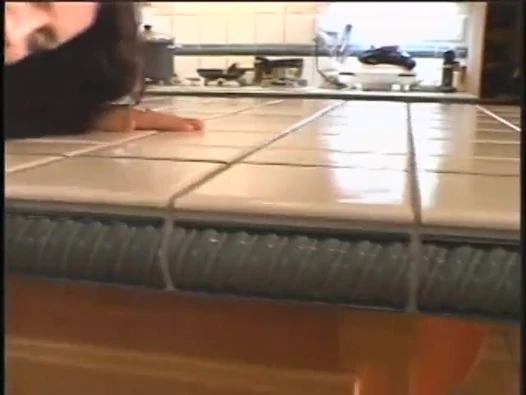 Tall brunette gets her hairy pussy pounded on the kitchen counter