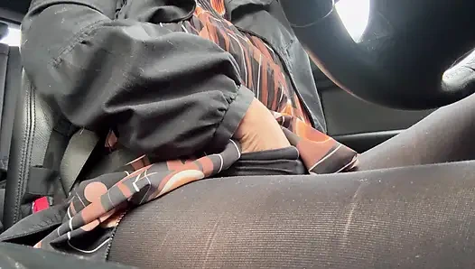 Elegant stepmom drives to the office wearing tights and a beautiful dress