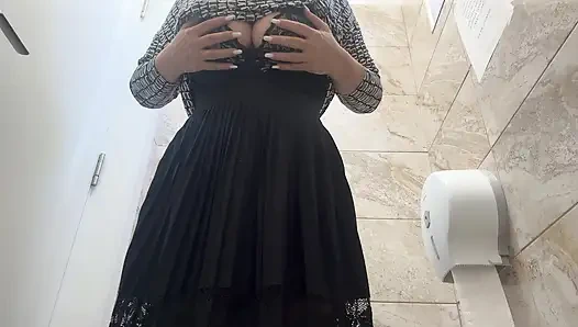 Horny sexy stepmom rubs her pussy in public toilet