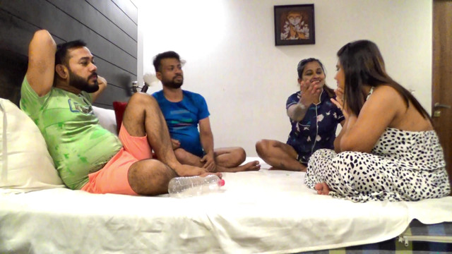 two couple were playing strip poker and gradually they inviolved sexual intercourse. They exchanged wife also.