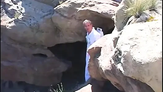 Astronaut stud lands on a planet where a blonde primitive babe sucks his cock outdoors