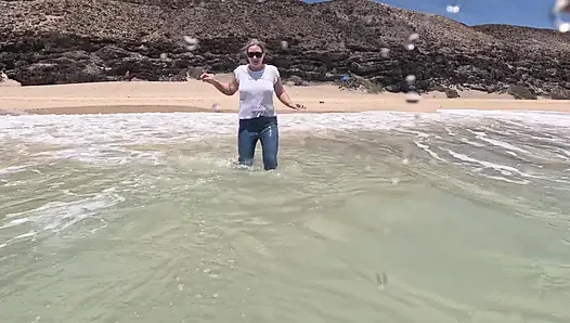 Girl Wetting Jeans in the Ocean and Swimming in Wet White T-shirt
