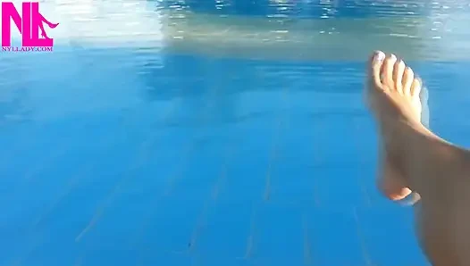 Barefoot Dangling in Swimming Pool Water