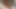 Siyah kıyafetli kıvırcık saçlı sulu orta yaşlı seksi kadın çifte penetrasyon hissetmek için uzun pembe dildo kullanıyor