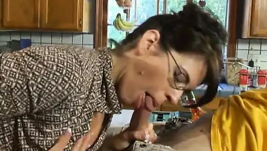 Lusty brunette milf in glasses seduced man next door on her kitchen