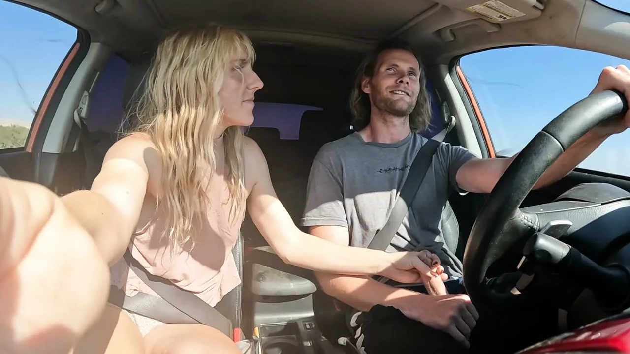 Petite Blonde Gives Her Man Road Head In The Car