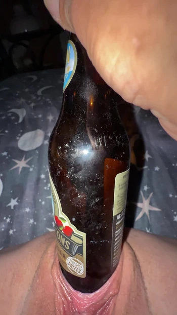 MILF's needy pussy with a bottle and a cheeky schlop and pop at the end