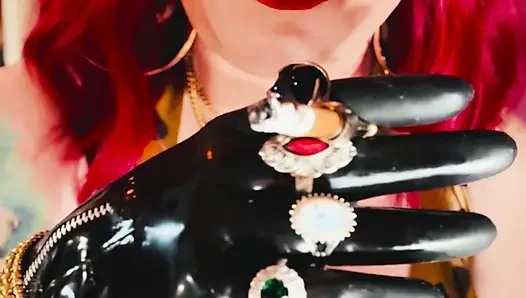 The Beautiful Rubber Beauty Tina Snua Smoking A Cigarette Using A Holder - Smoker Latex Gloves Rings Jewellery