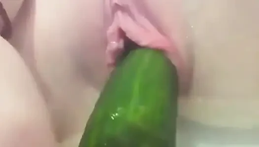 Cucumber inside my pussy while showering